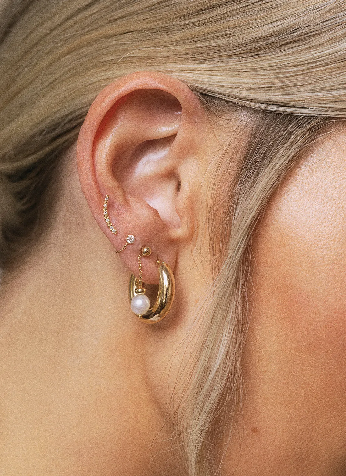 Pinhead Diamond earstud 14k gold